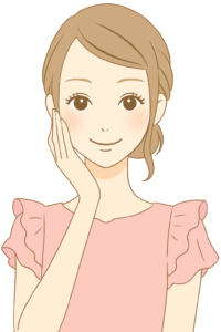 頬に手を当たて明るい表情で微笑む女性